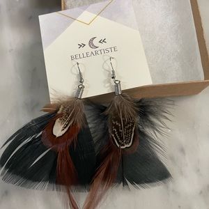 Brand new feather earrings